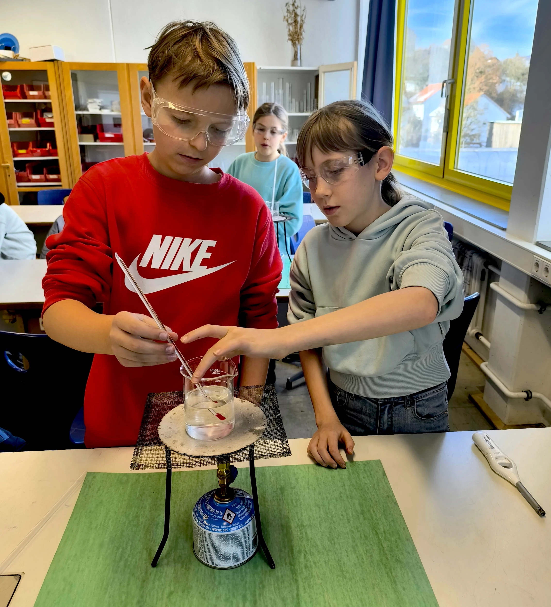 Wasser erhitzen mit dem Bunzenbrenner